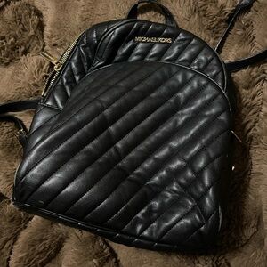 Michael Kors Quilted Black Backpack with Gold Accents